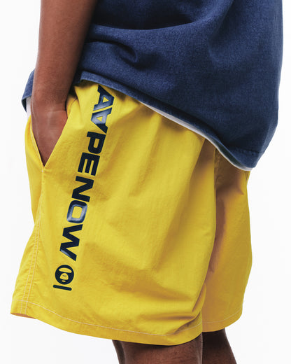 Shorts tejidos AAPENOW con logo moonface
