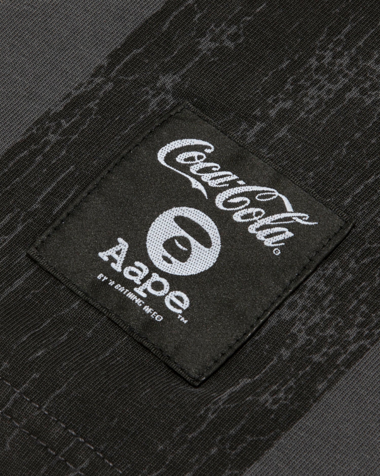 AAPE X Coca Cola AAPEUNVS graphic tee | Aape official website